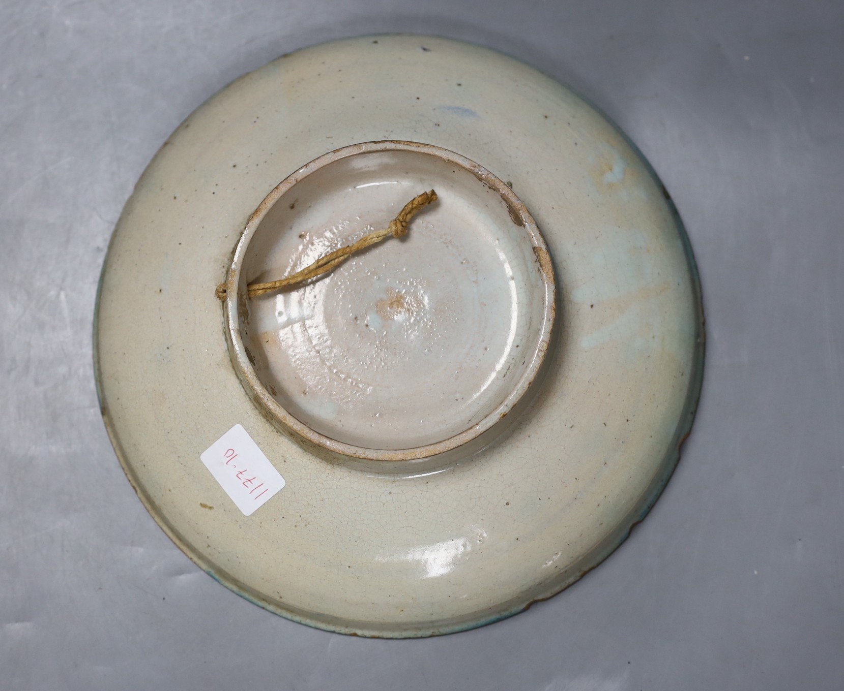 A Moroccan pottery dish, diameter 26cm